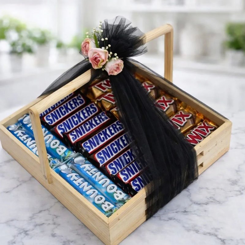 Chocolate Gift Basket with assorted chocolates and black ribbon decoration