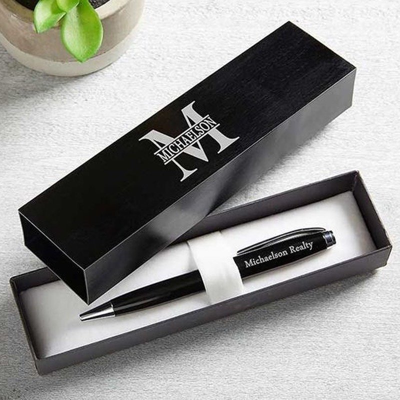 Custom engraved pen in a wooden box with personalized text