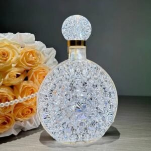 Luxury LED perfume bottle with glowing purple light and crystal design