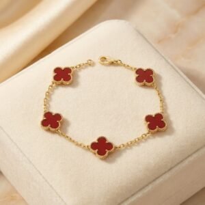 Gold clover bracelet with elegant four leaf charm design