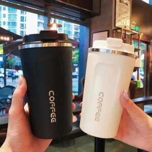 Black and white coffee travel mugs with drinking lids and stainless steel rims