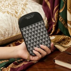 Women's long wallet with black and grey geometric print and zip-around closure