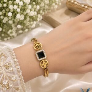 Gold bracelet for women with black square center and crystal details
