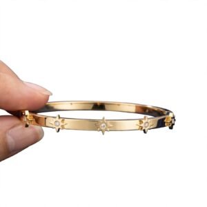 Golden star bracelet with elegant design and decorative star charms